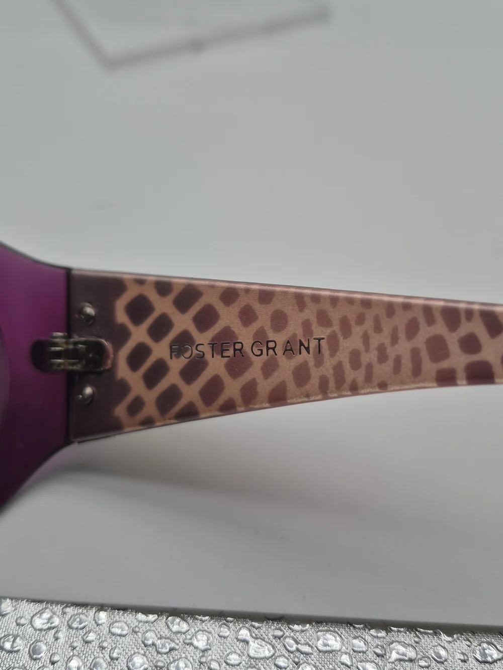 Foster Grant statement purple